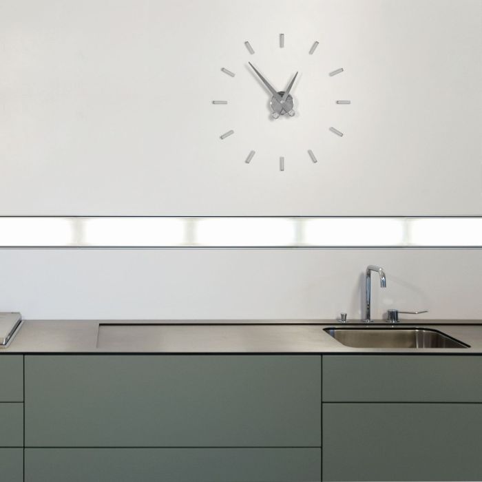 Puntos Suspensivos Wall Clock, Four Numbers, Chromed / Polished Steel